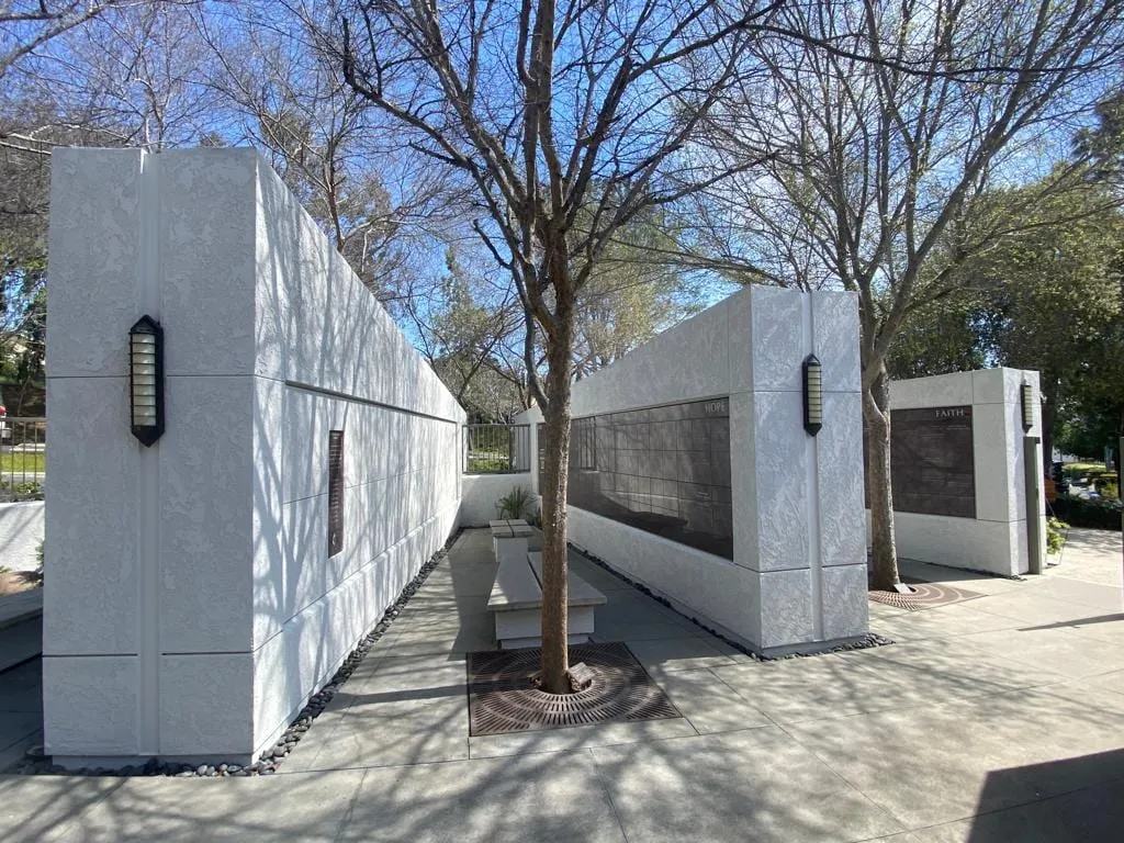 Sealing and finishing a stone memorial wall